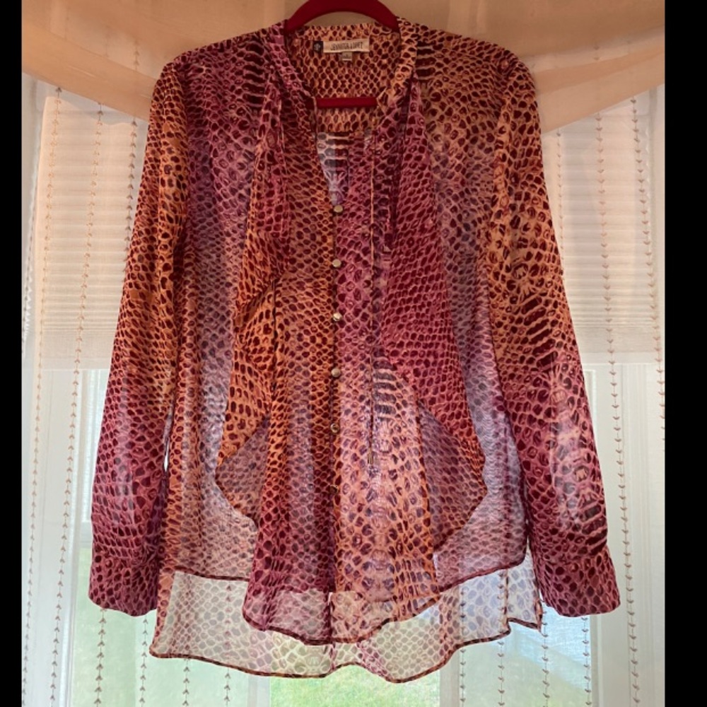 Jennifer Lopez pink long sleeve blouse